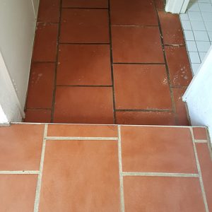teracotta-tiles-being-cleaned